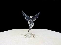 handblown glass Angel figurine with solid glass wings, Halo, hollow dress holding a cluster of grapes.