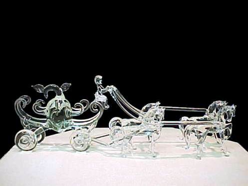 Cinderella wedding cake top with four horses, carriage and driver all genuine hand blown glass.