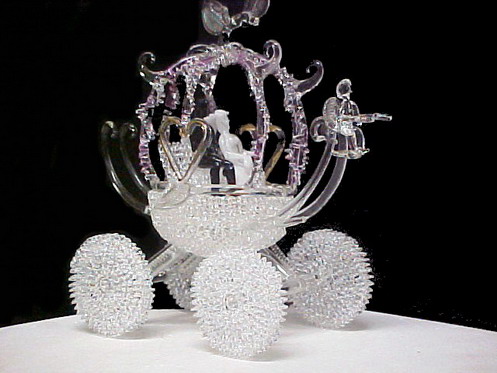 Cinderella Coach wedding cake top all genuine hand blown glass with bride and groom and a buggy driver.
