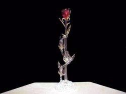 solid glass rose painted red with lots of gold