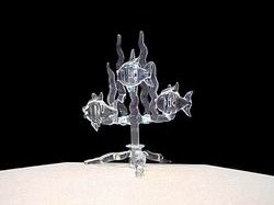 solid glassfish wedding cake top with three solid glass fish, solid glass coral on a glass base
