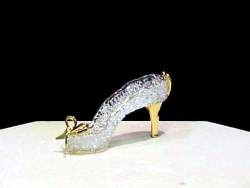 very large knitted glass slipper with solid glass wedding bow, heart and medium-size heel