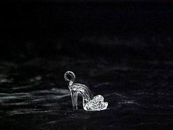 solid glass slipper wedding favor with a loop for hanging