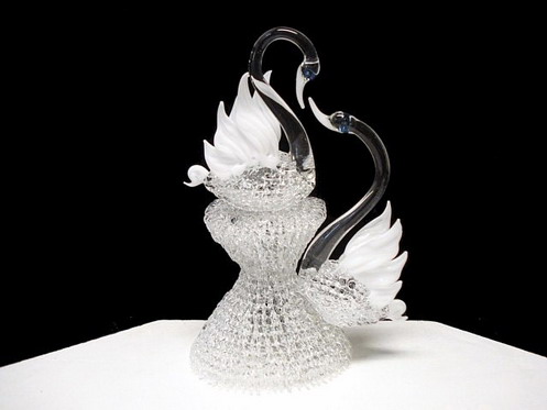Swans wedding cake top all hand blown glass with white detail.